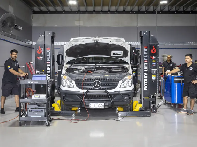 Technician working under the bonnet at StarTech Prestige, Cranbourne West