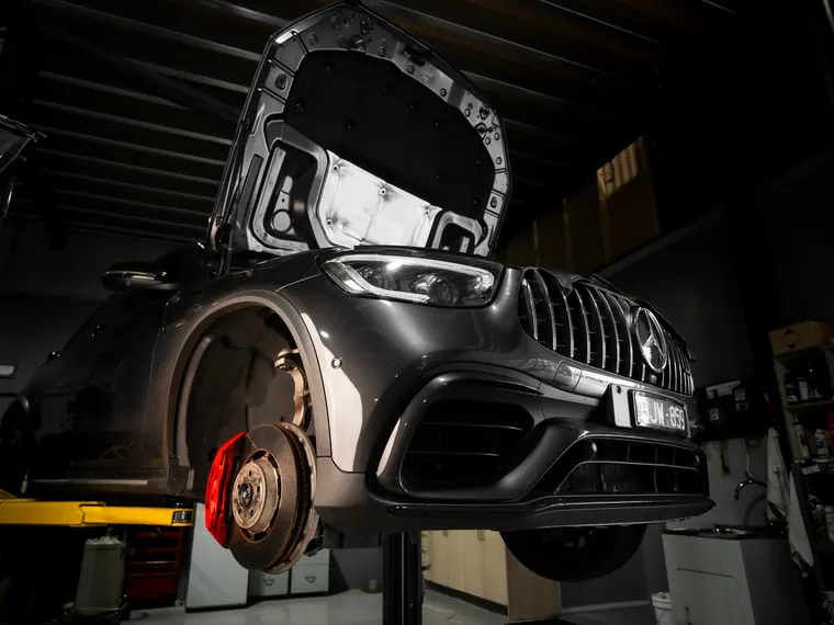 Car on the hoist for a pre-purchase inspection